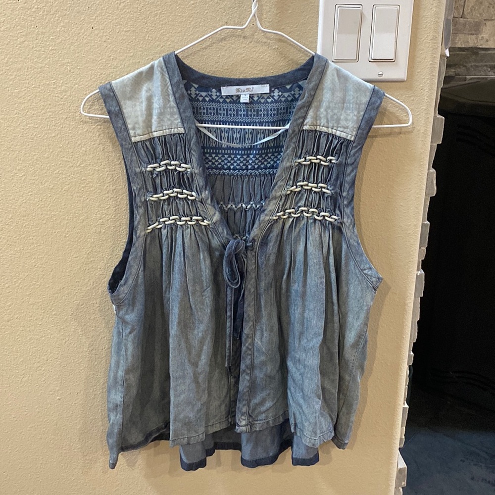 Women’s size small gently used Miss Me brand vest.
